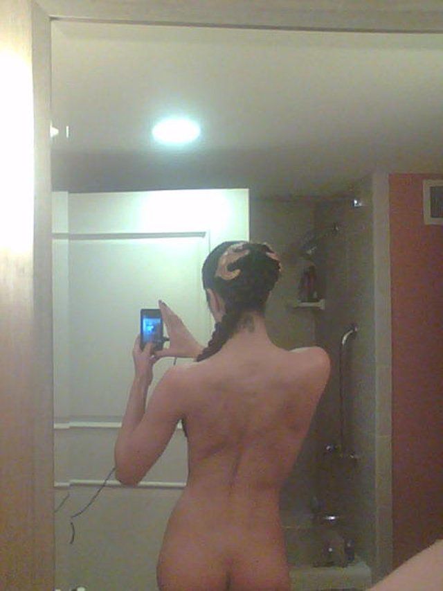 Adrianne Curry Shows Off Her Butt in Naked Bathroom Selfie