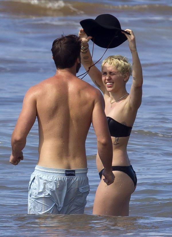 Bathing Boobies! Miley Cyrus Goes Topless On Hawaiian 