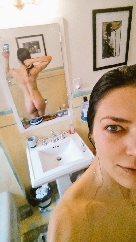 Adrianne Curry in bathroom.